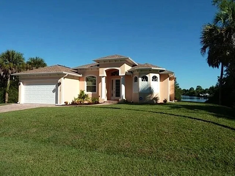 Brand-new (2014) luxury villa with a waterfront, a boat deck and a heated pool
