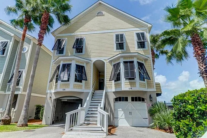 124 Waters Edge- Premier Riverfront Town Home! Screened porch, Community Pool Access, & Fishing Dock!