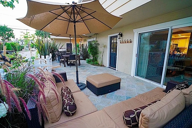 Kick back on Large Patio Close Beach & Village Garage