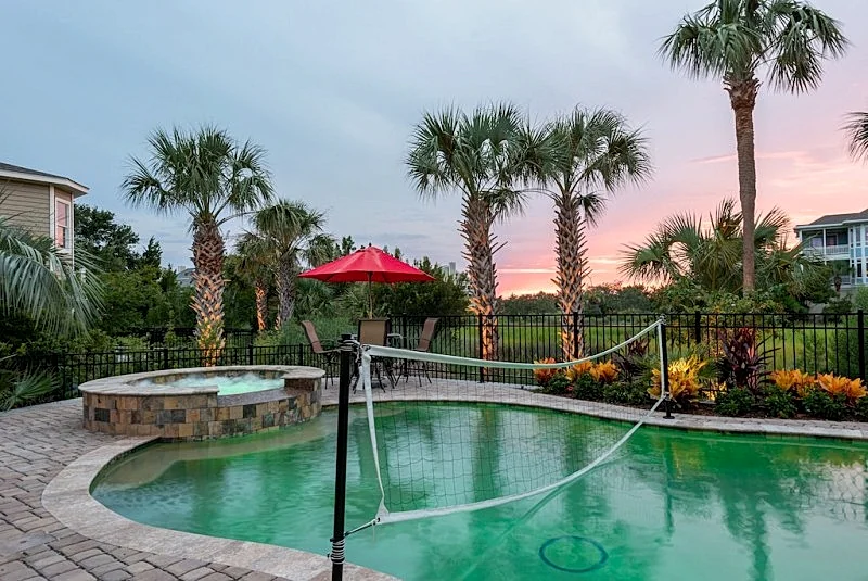 Luxurious CAROLINA ELEGANCE has pool; sleeps 12; 4 bedrooms; 3.5; on the marsh