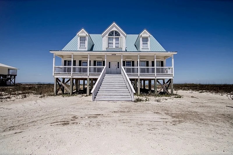 Large Bayfront Home on sandy Bay beach with large screened porch. in Dauphin Island, Alabama, United States — photo 1