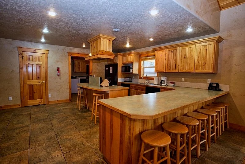 Cascade Multi-Family Cabin - 1 Block to Lake Cascade and Golf Course - Game room - Wood stove in Cascade, Idaho, United States — photo 5