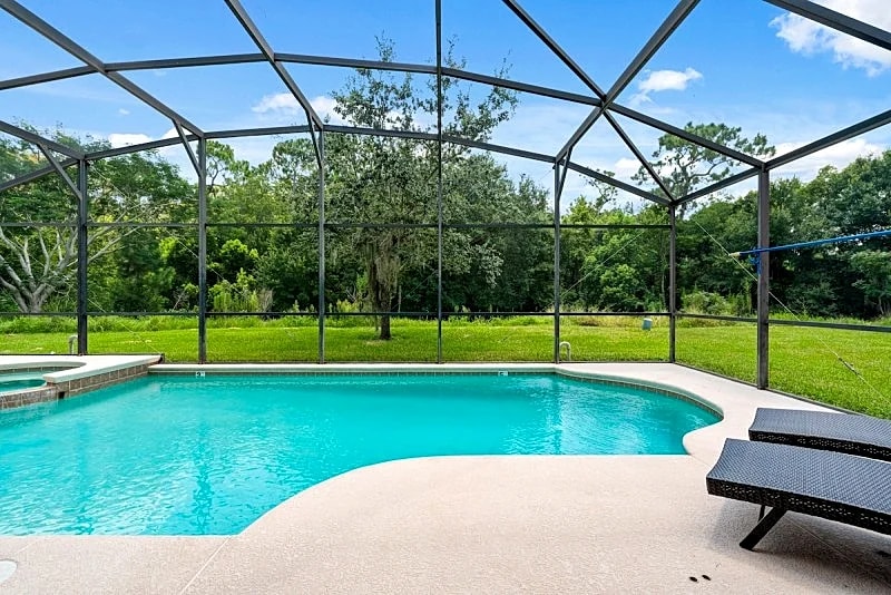 Bella Vida Paradise | Games,Theater Room | Screened-in Pool in Kissimmee, Florida, United States — photo 2