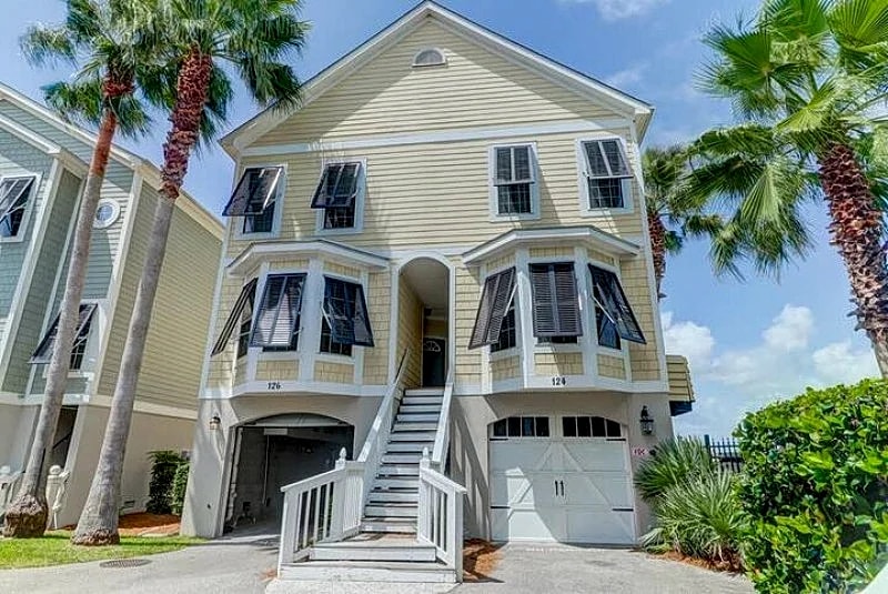 124 Waters Edge- Premier Riverfront Town Home! Screened porch, Community Pool Access, & Fishing Dock!