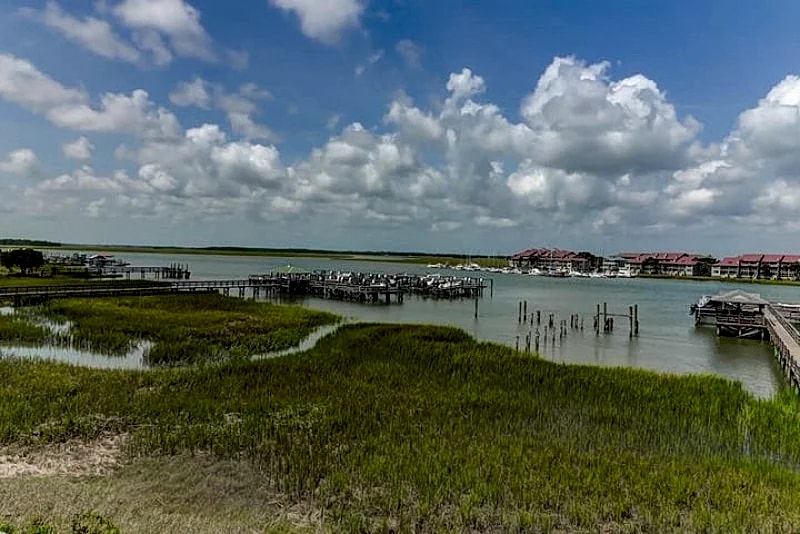 124 Waters Edge- Premier Riverfront Town Home! Screened porch, Community Pool Access, & Fishing Dock! in Folly Beach, South Carolina, United States — photo 4