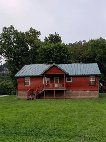 Beautiful cabin style home backing up on the White River! in Mountain View, Arkansas, United States — photo 3
