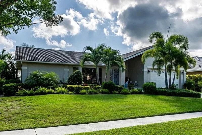 A perfect 3 BDR 2 BTH pool home with coastal vibes