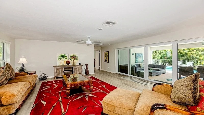 As you approach this lovely vacation home, lush greenery and shade trees... in Marco Island, Florida, United States — photo 5