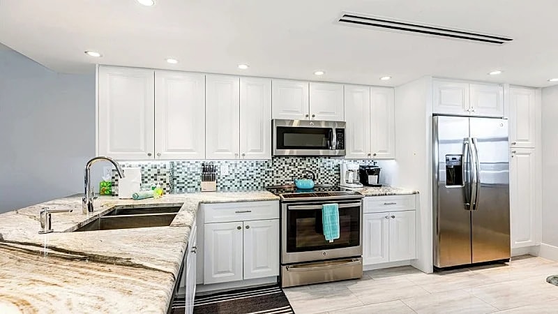 This newly renovated two-bedroom, two-bath beachfront condo with great views...