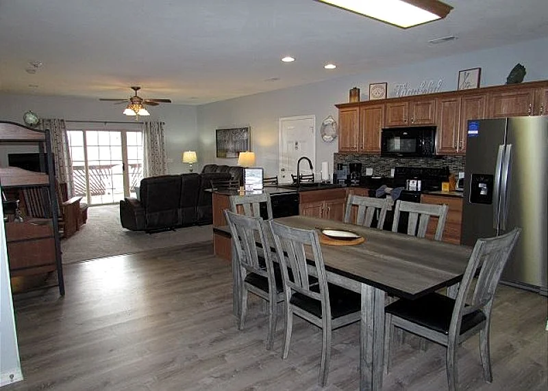Enjoy sunsets and a dock for your boat from this walk-in condo.