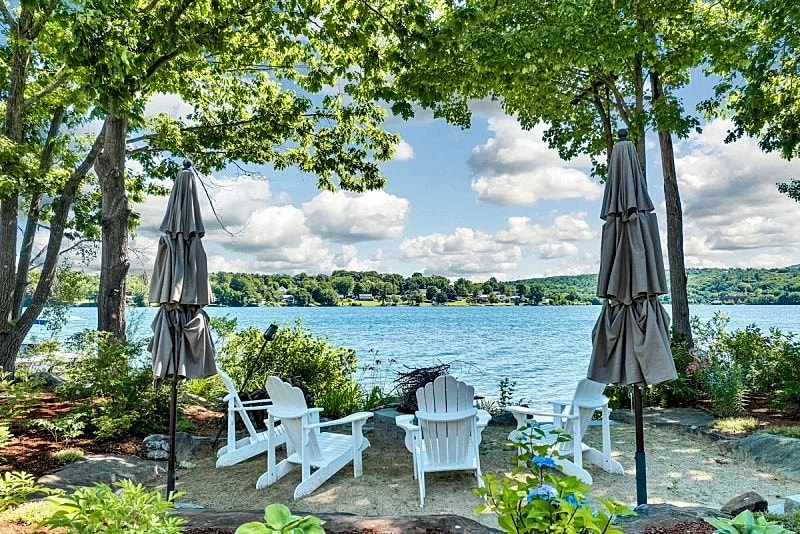 Modern Lake Opechee Home features Sandy Perched Beach and Dock in Laconia, New Hampshire, United States — photo 4