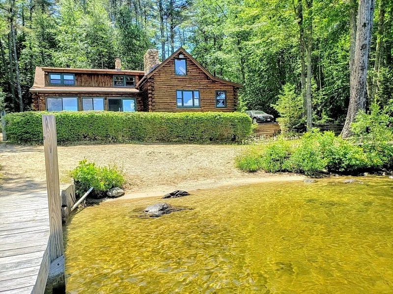 Tuftonboro Waterfront Home on Winnipesaukee with Sandy Beach sleeping 10
