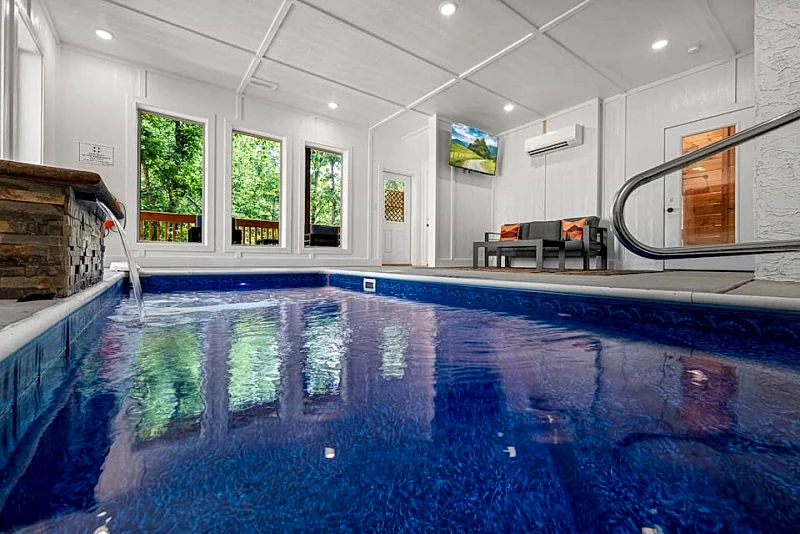 A Bear's Creek Oasis Cabin w/ Indoor Pool, Hot Tub, Putt Putt