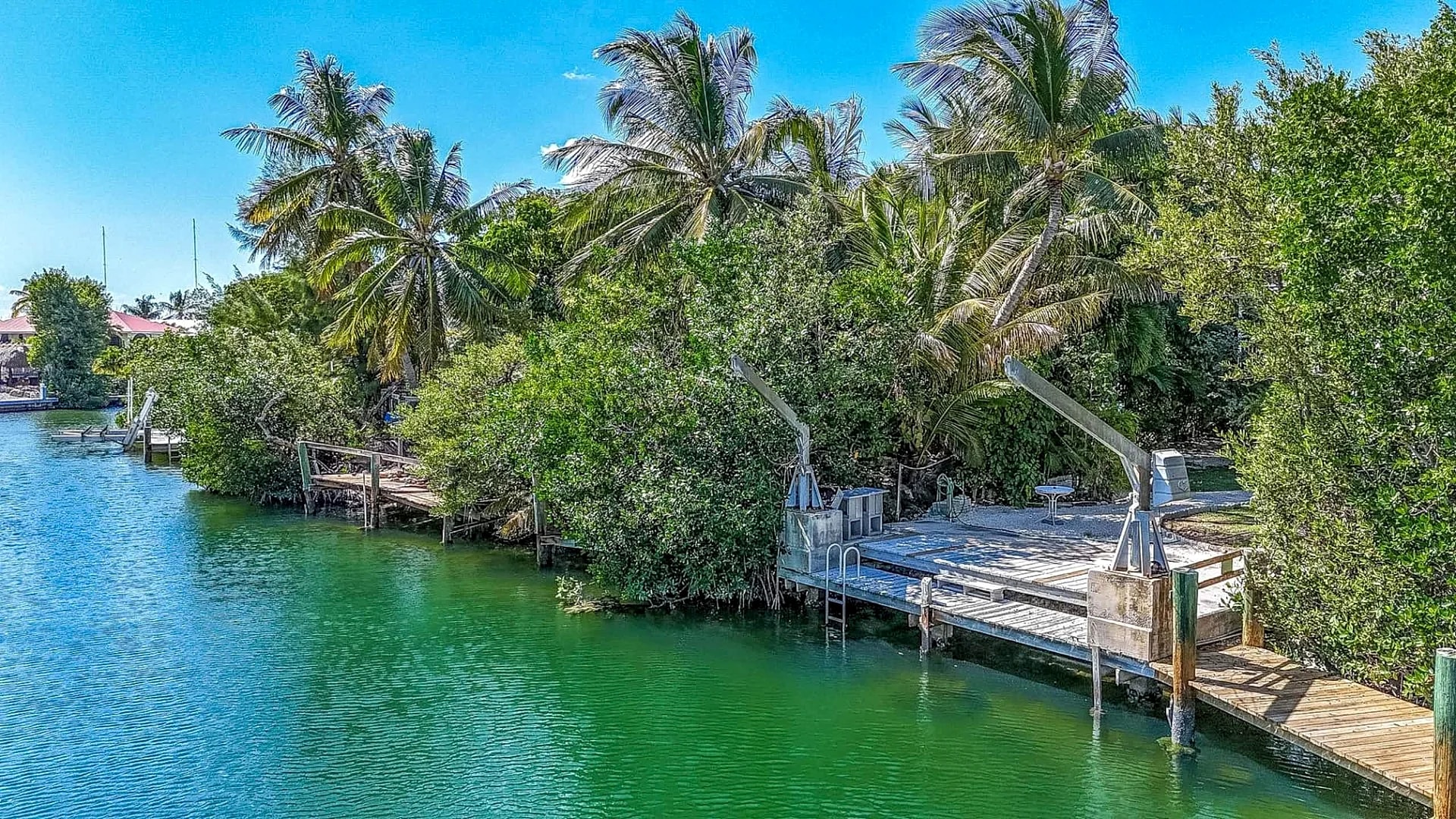 Welcome to Almost Paradise, a 3 bedroom 2 bath tropical home tucked away on Flamingo Island.