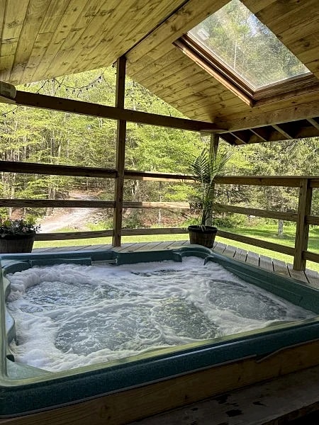 Lake, Swimming pond on property, Hot tub, fire pit, grill and more, pet friendly - Poconos in Paupack, Pennsylvania, United States — photo 5