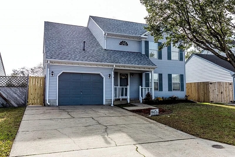 A quiet lakeside home for family, business, or both to relax or be productive.