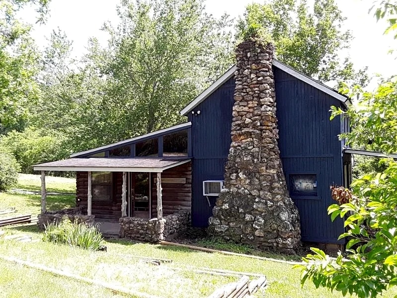 Spacious but cozy farmstead lodge has stone fireplace and sleeping for 9 to 10