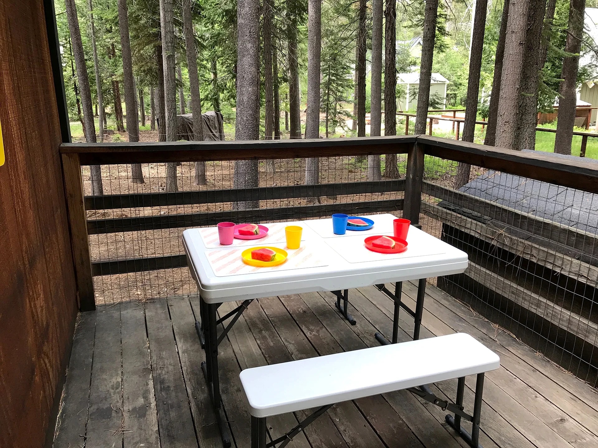 Deck at Walk to Lake + Beaches | Dog-Friendly Wooded Cabin in Tahoma, California, United States