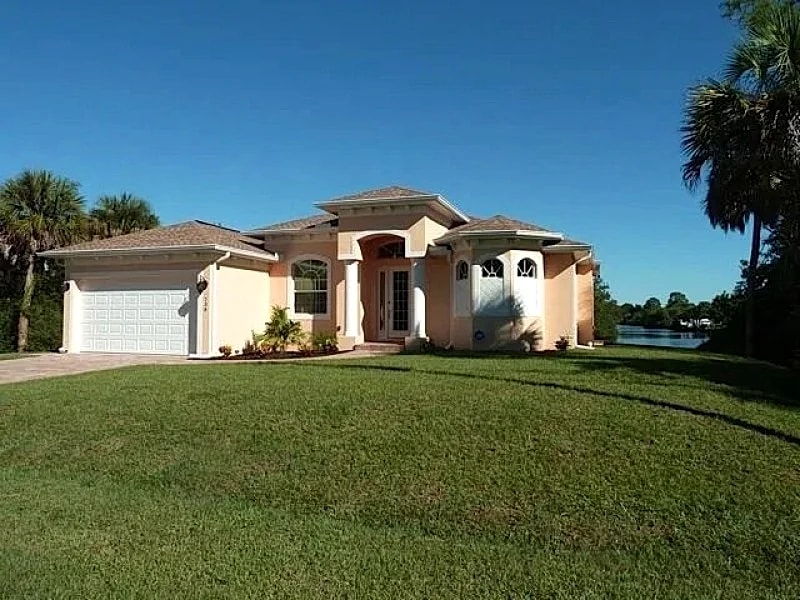 Brand-new (2014) luxury villa with a waterfront, a boat deck and a heated pool