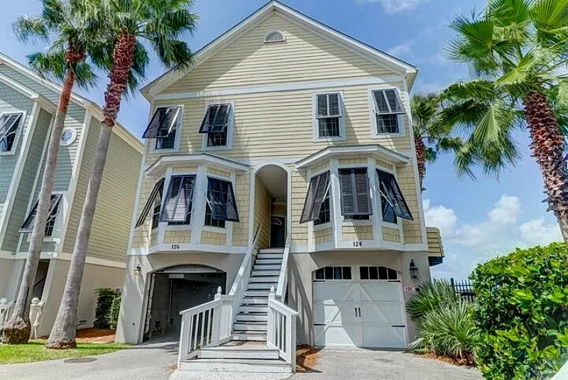 124 Waters Edge- Premier Riverfront Town Home! Screened porch, Community Pool Access, & Fishing Dock!