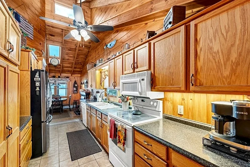 Winnipesaukee Lake Front Cottage with Sandy Beach and 25ft Dock Sleeps 8 in Moultonborough, New Hampshire, United States — photo 5