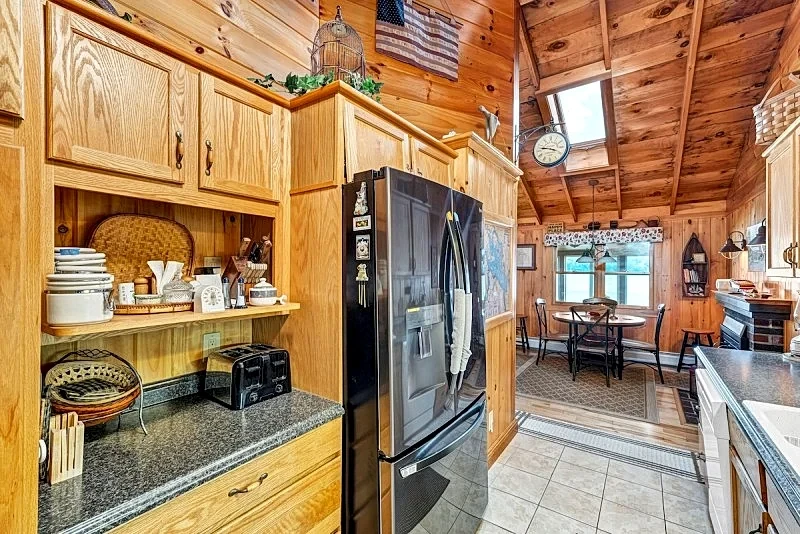 Winnipesaukee Lake Front Cottage with Sandy Beach and 25ft Dock Sleeps 8 in Moultonborough, New Hampshire, United States — photo 4