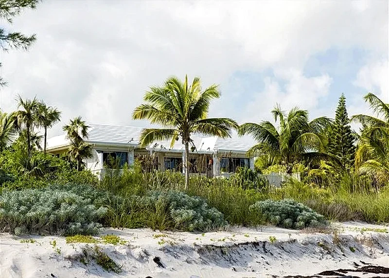 PRIVATE BEACHFRONT ESTATE WITH POOL ON MILES-LONG PINK-SAND BEACH